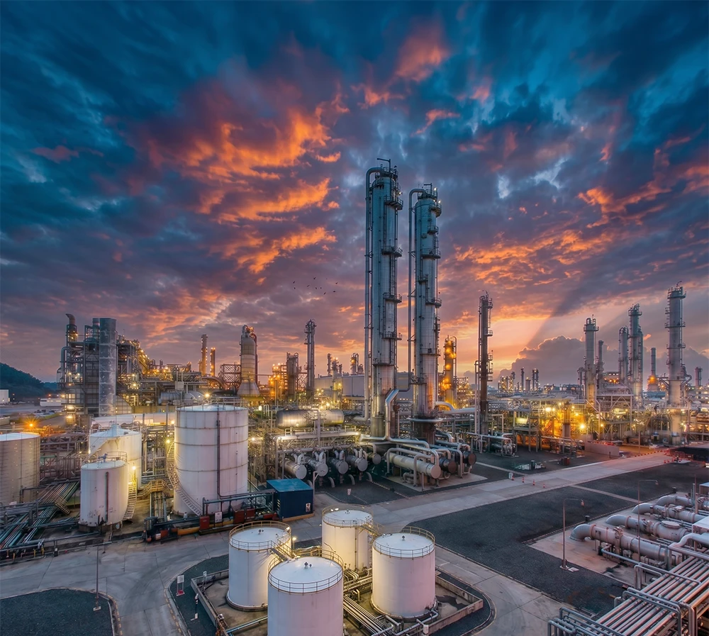 Aerial view of oil refinery and petrochemical plant at dusk — industrial operations UAE